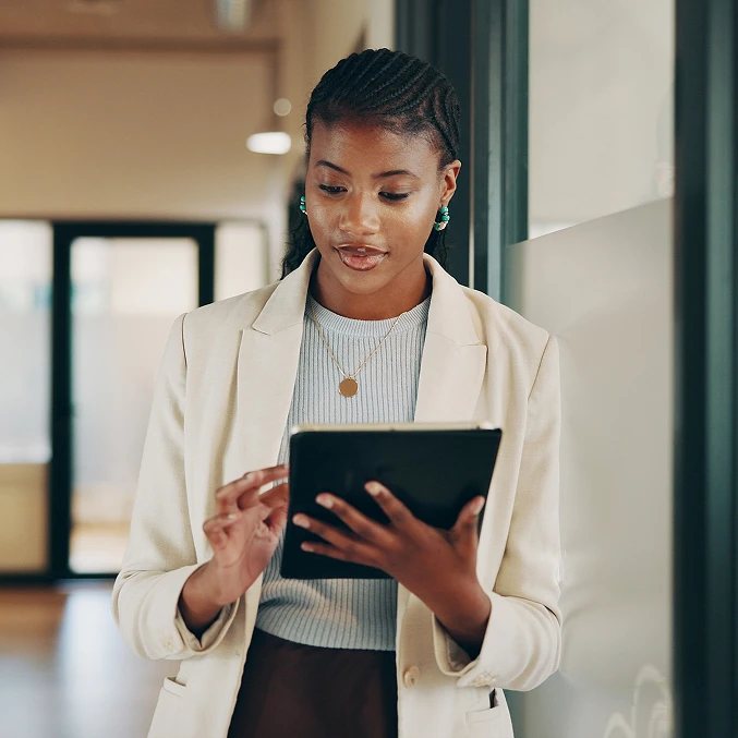 Operator reviewing sales on a tablet